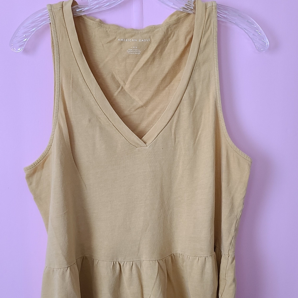 American eagle outfitters yellow peplum top L